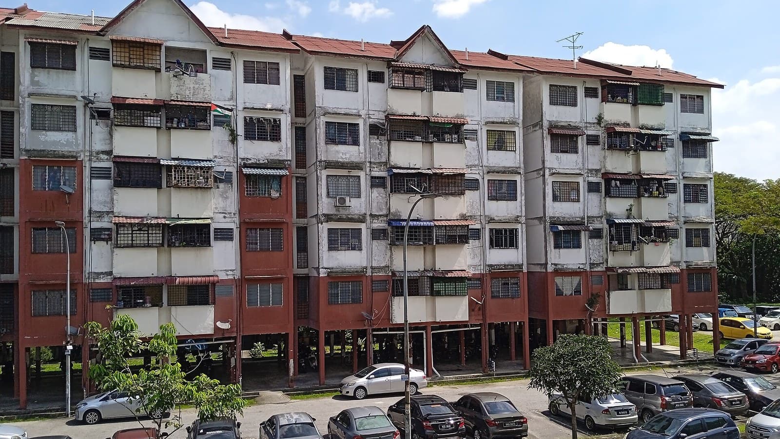 Condo Service Charges in Malaysia 2026: Who Sets Them, the 10% Interest Cap, and the RM250,000 Tribunal That Hears the Fight