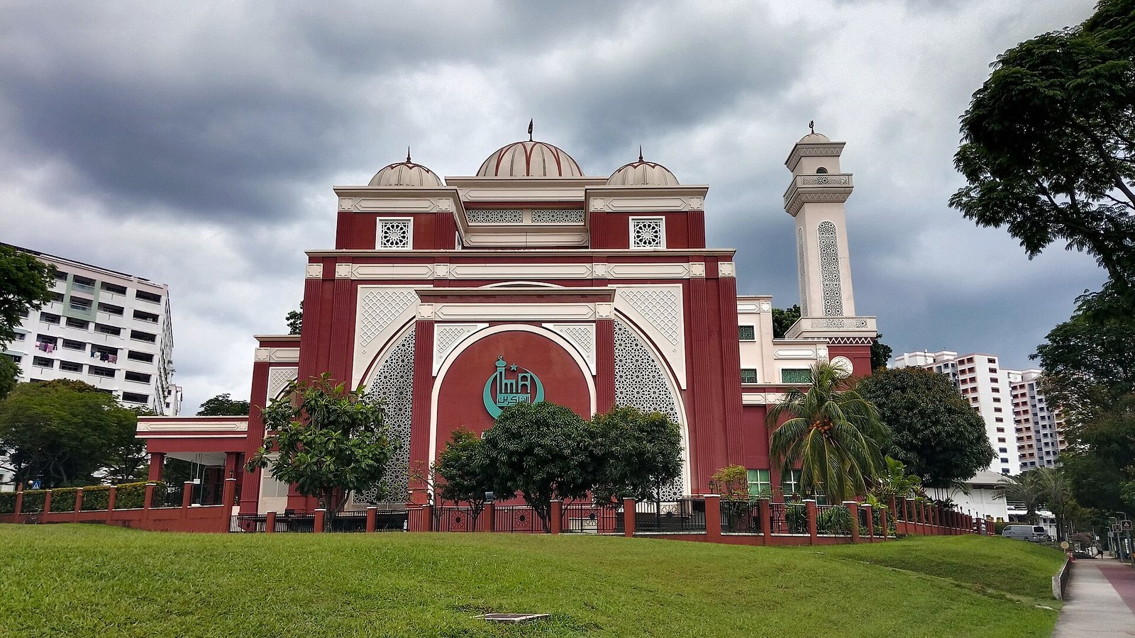 Masjid Assyakirin — the red-and-white mosque with a man-made waterfall